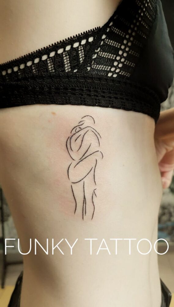 tatuaj cel mai frumos fete coaste love scris cheia sol alb negru sexy salon tatuaje si piercing Funky tattoo Bucuresti
