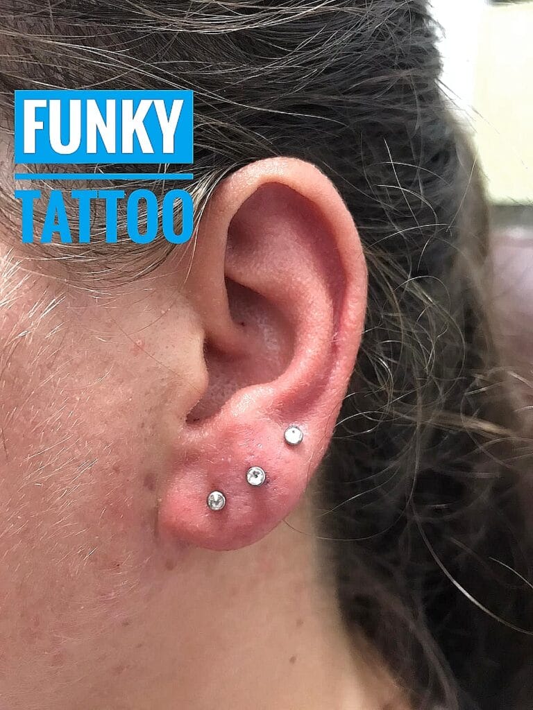 piercing lob , cercei ureche lob salon tatuaje si piercing Funky tattoo bucuresti