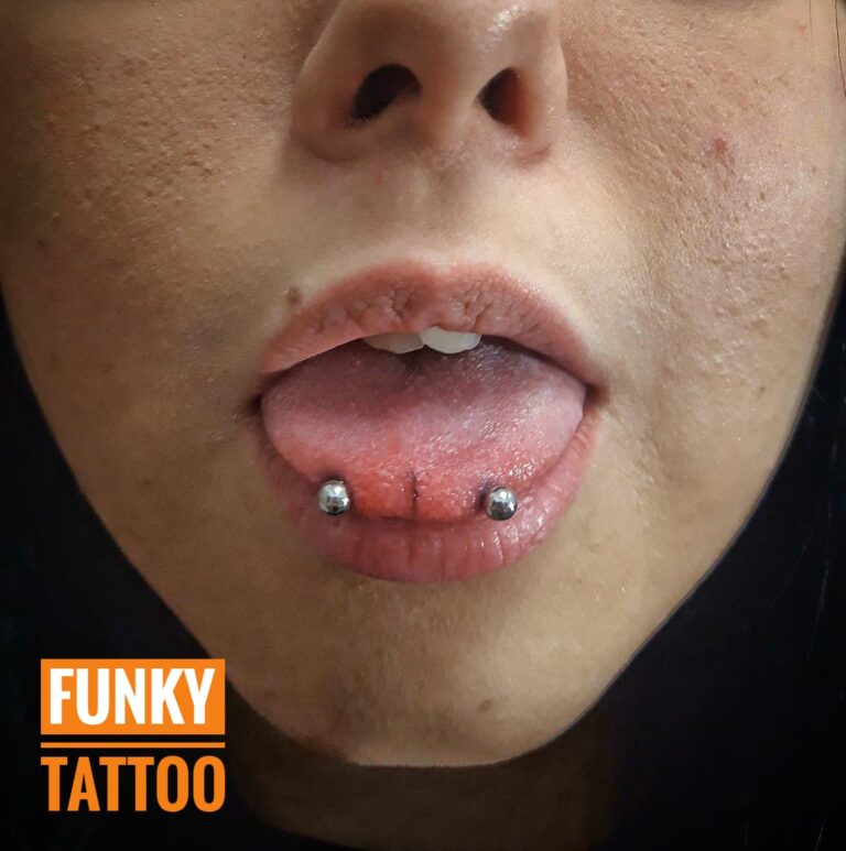 Piercing snake carcel limba Salon tatuaje si piercing Funky Tattoo