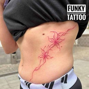 tatuaje fete flori color tatuaje pe coaste salon tatuaje bucuresti